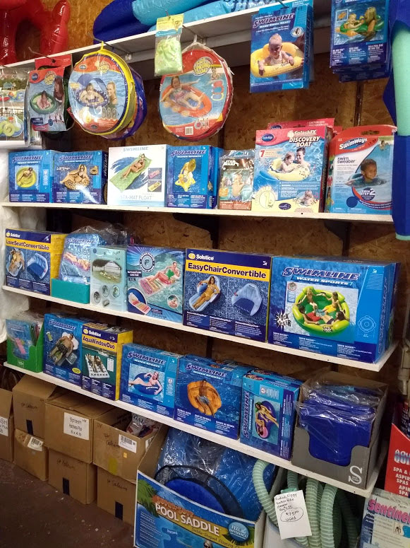 large selection of pool toys